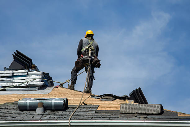 Professional Roof Replacement technician working in New Town, MA